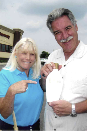 Sue and Tom with RumChata bottle copy